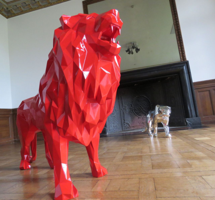 geometric shape red lion statue