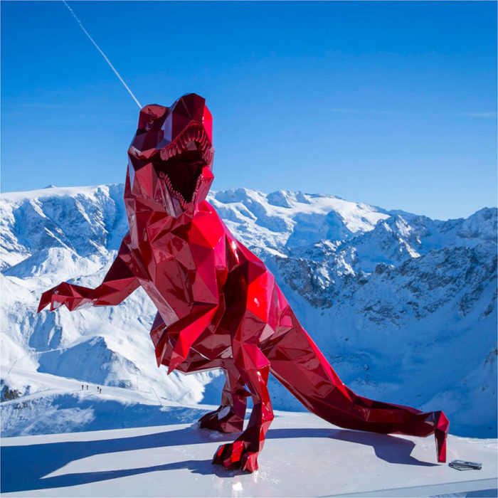 resin red dinosaur statue