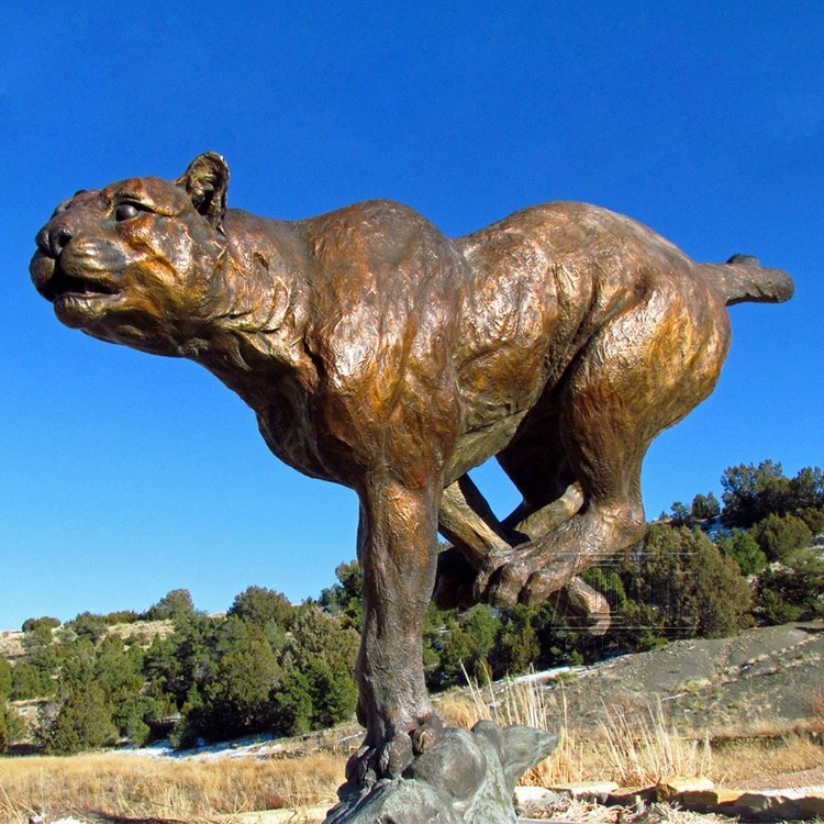 running jaguar statue