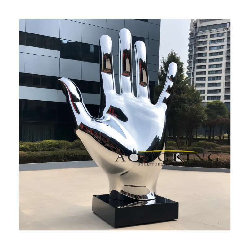 stainless steel minimalist open-palm metal hand sculpture